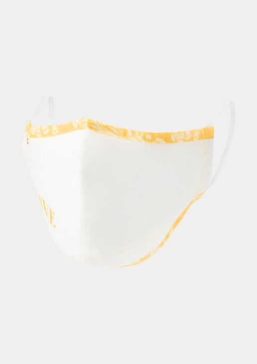 Face mask with a printed pattern from comma