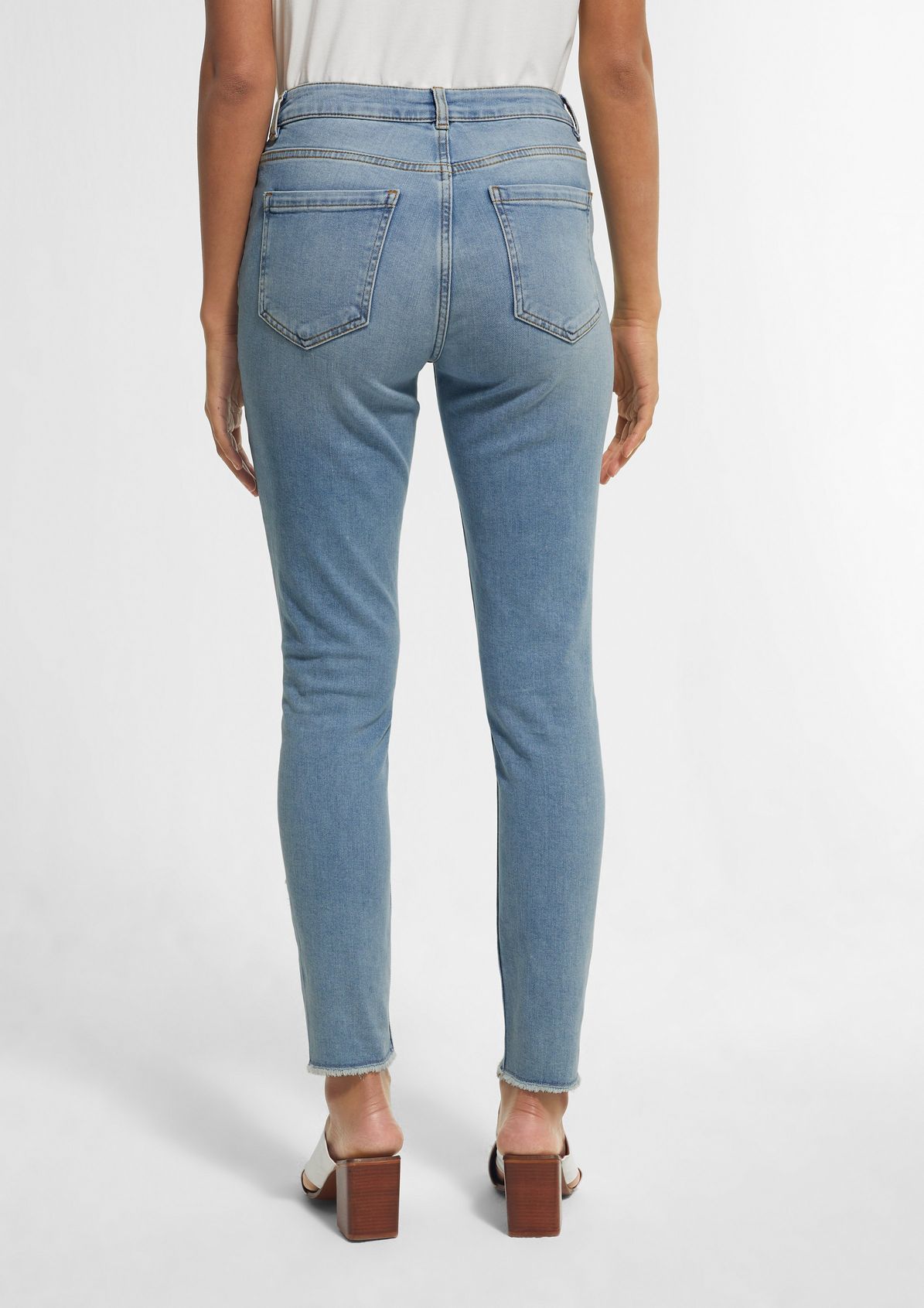 Skinny Fit: Jeans mit Fransen 