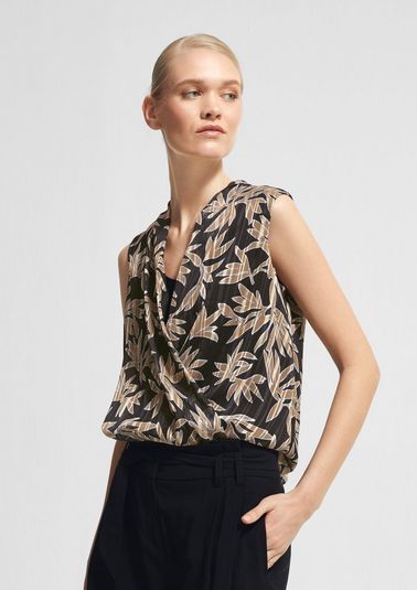 Blouse top with a lower layer made of jersey from comma