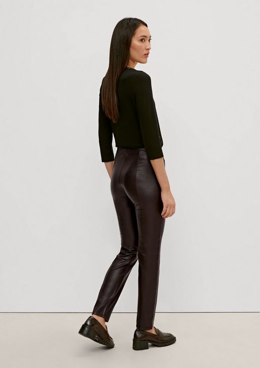 Slim: faux leather trousers from comma