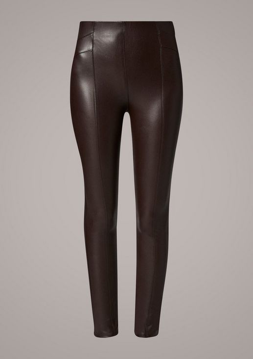 Slim: faux leather trousers from comma
