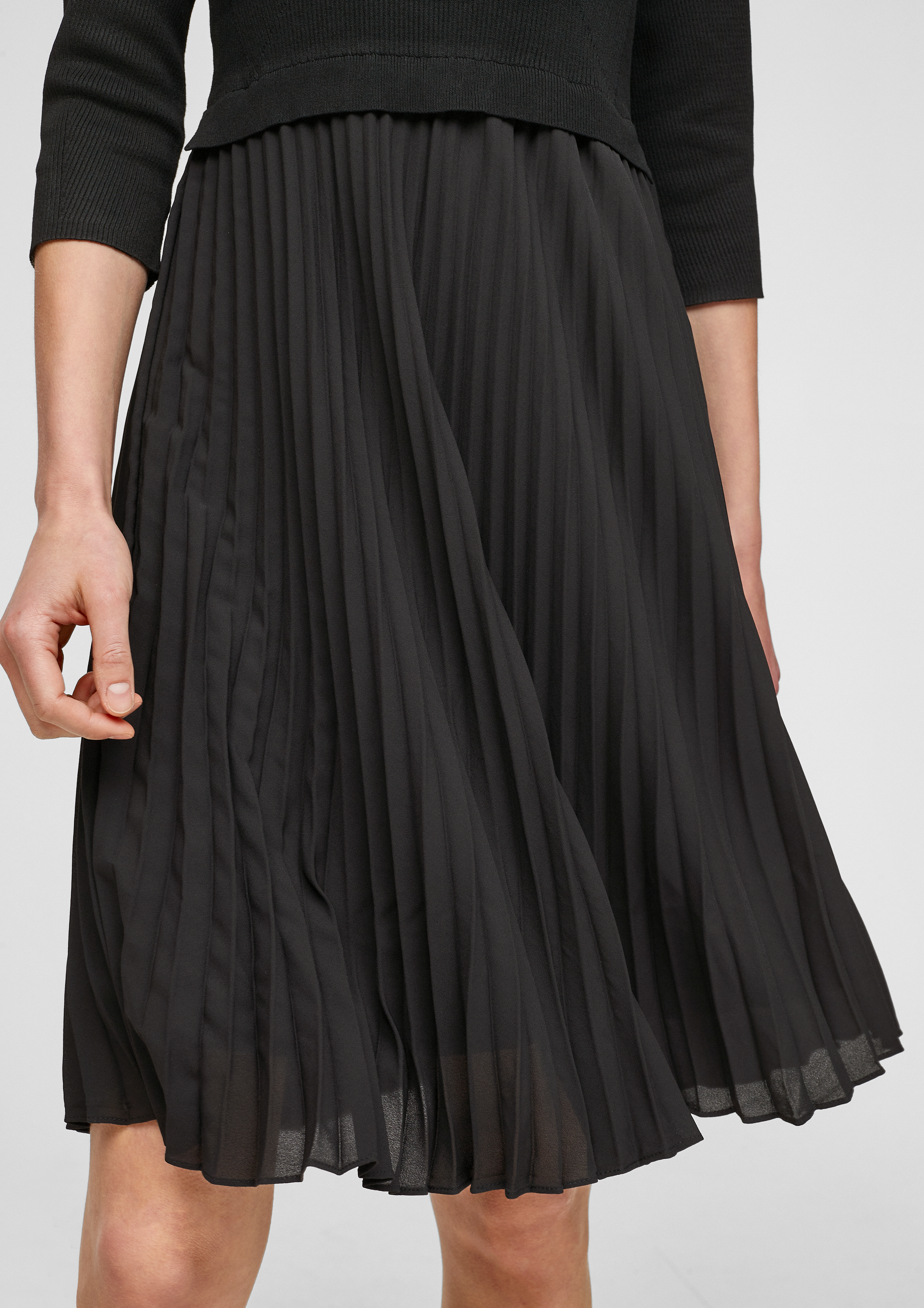 black pleated chiffon dress