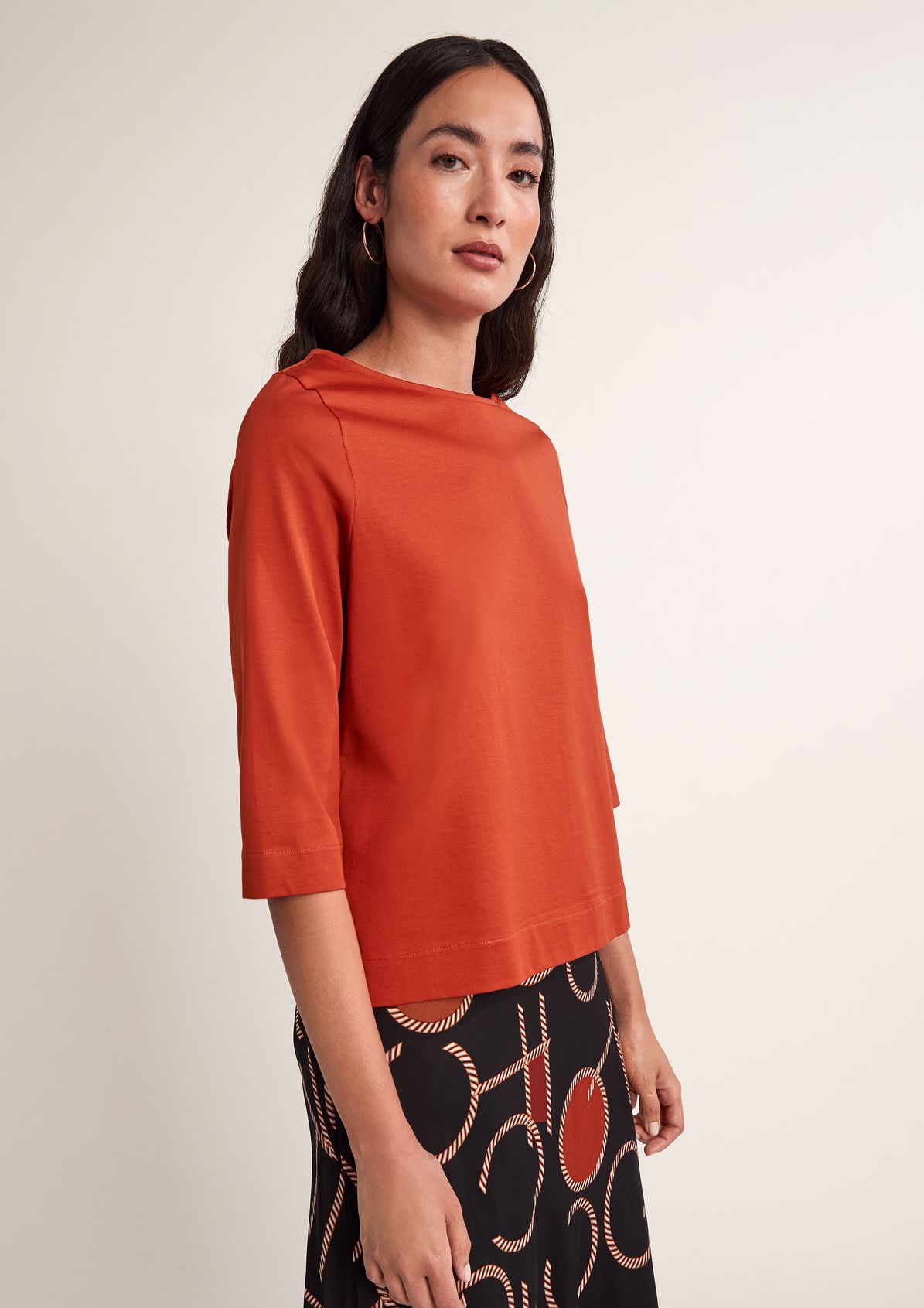 Top with a bateau neckline from comma