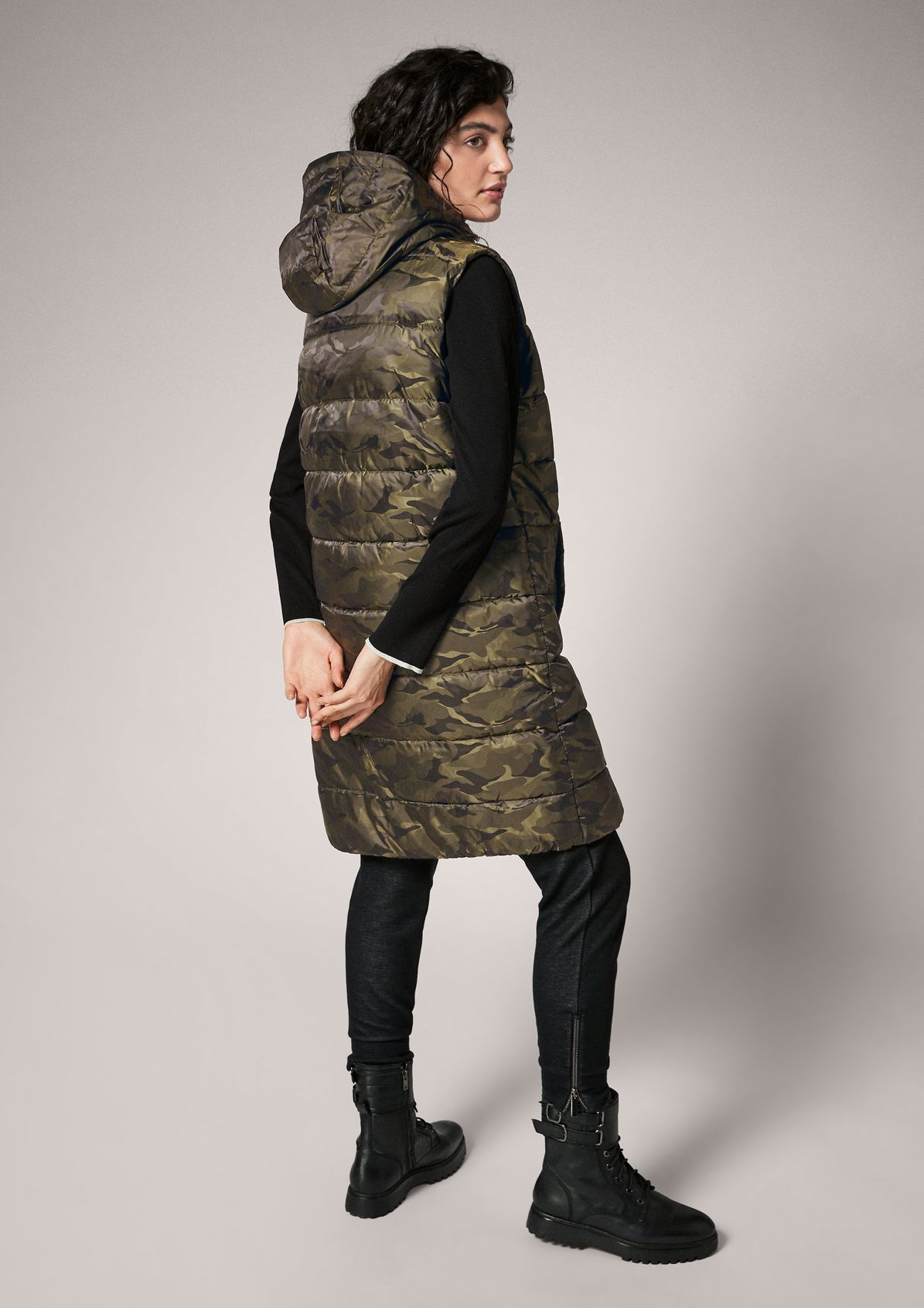 Puffer body warmer in a camouflage look from comma