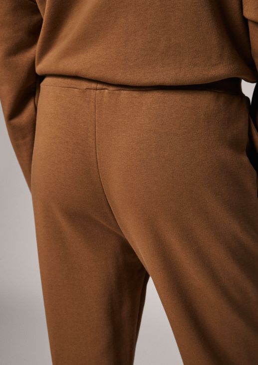 Regular: tracksuit bottoms with embroidery from comma
