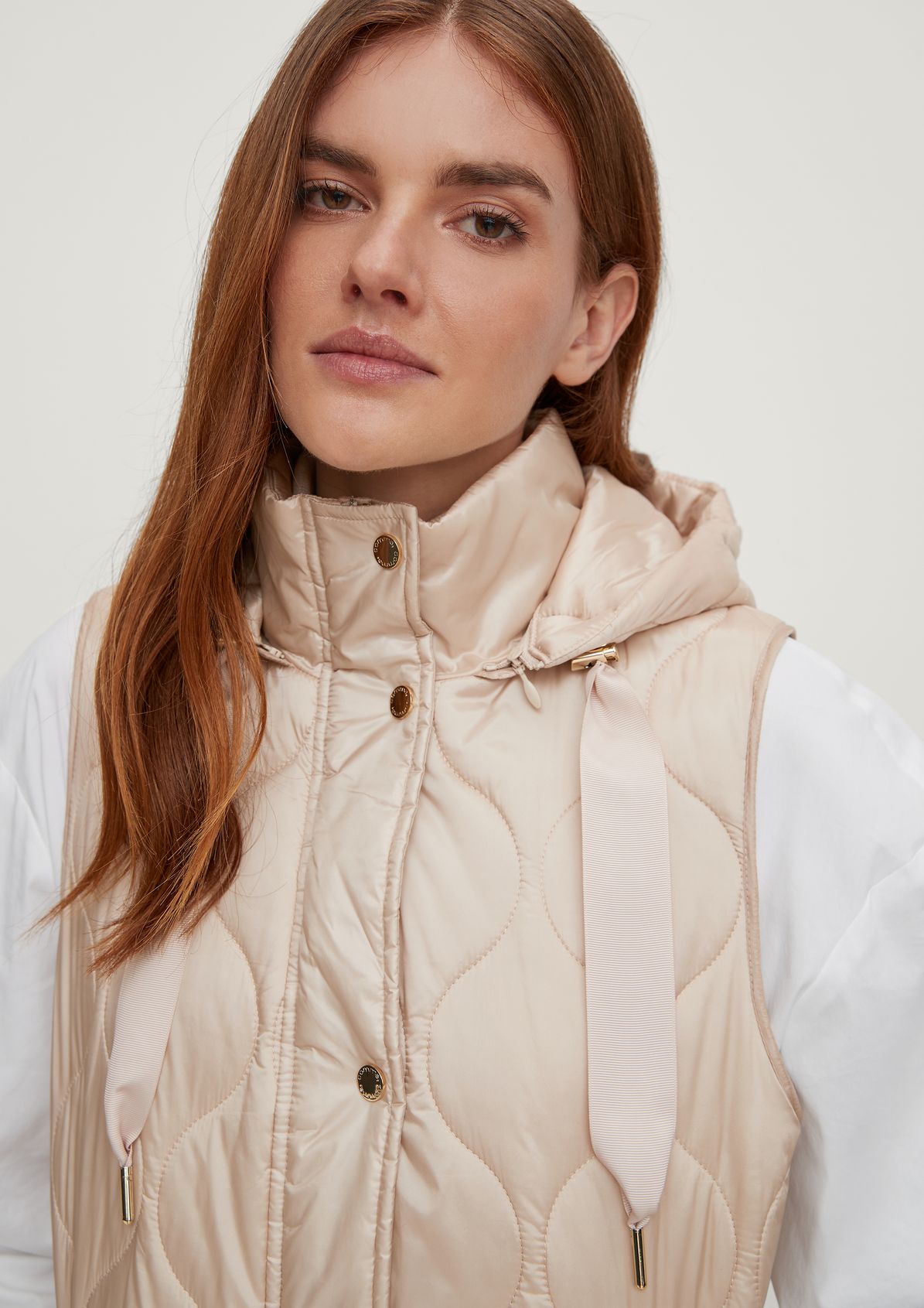 Lightweight bodywarmer with tie from comma