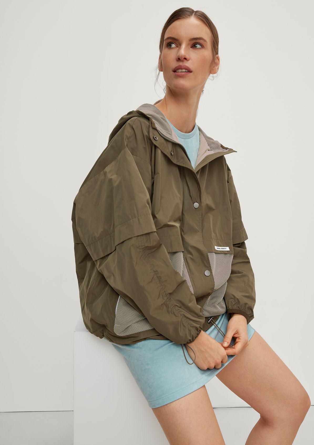 Loose-fitting bomber jacket with mesh details from comma