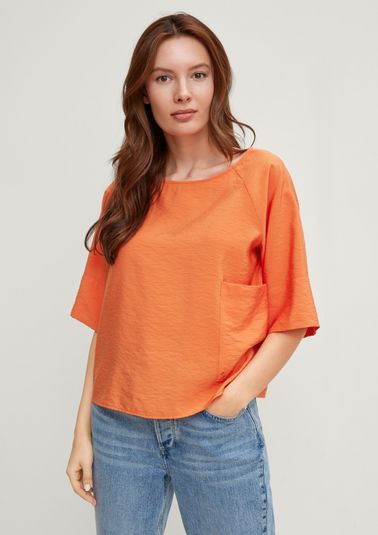 Raglan blouse with a pocket from comma