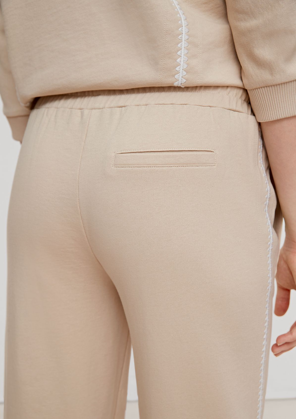 Relaxed: tracksuit bottoms with embroidery from comma