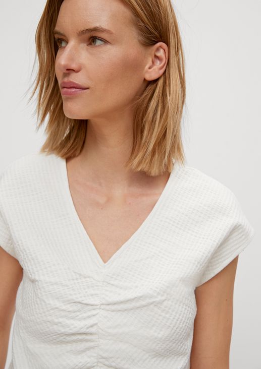 Textured top with gathering from comma