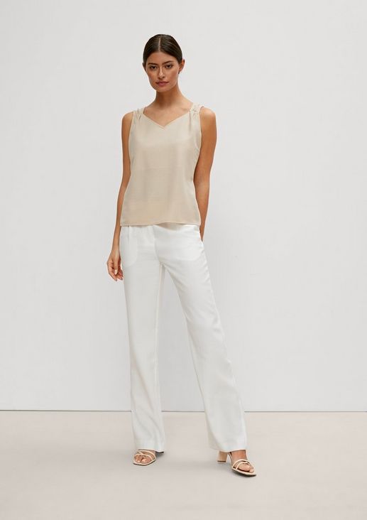 Top with gathered straps from comma