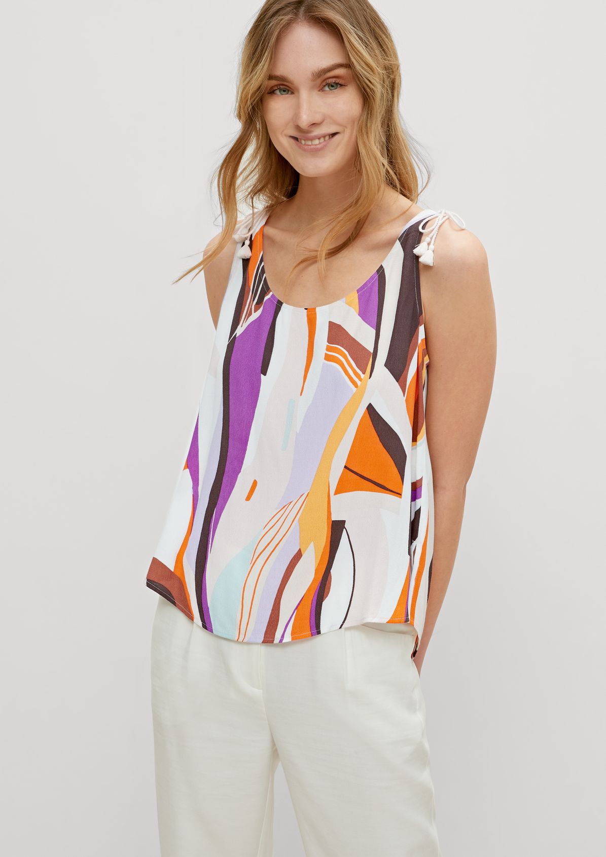 Top with an abstract all-over pattern from comma
