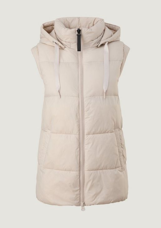 Quilted body warmer with detachable hood from comma