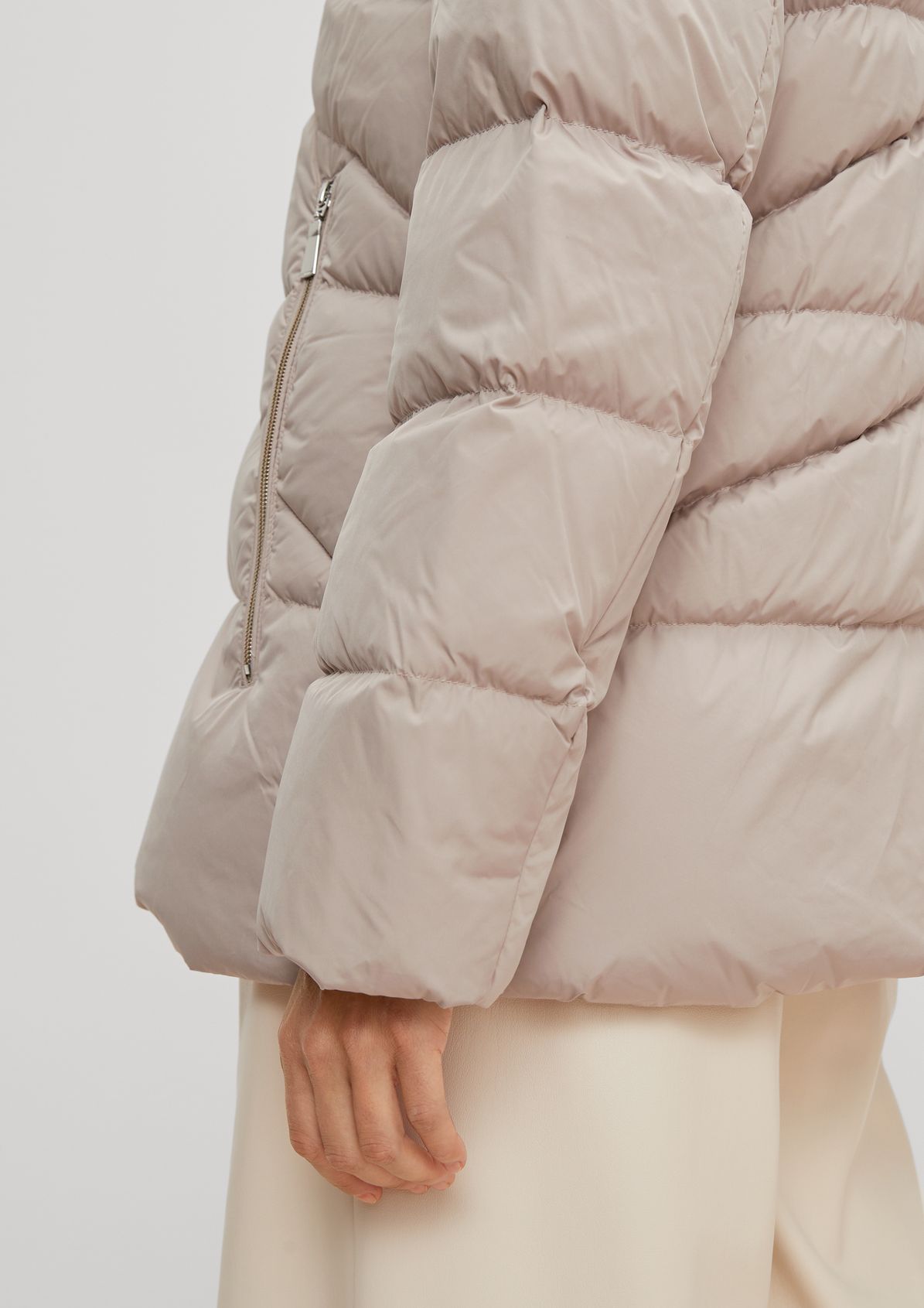 Down jacket with distinctive quilting from comma