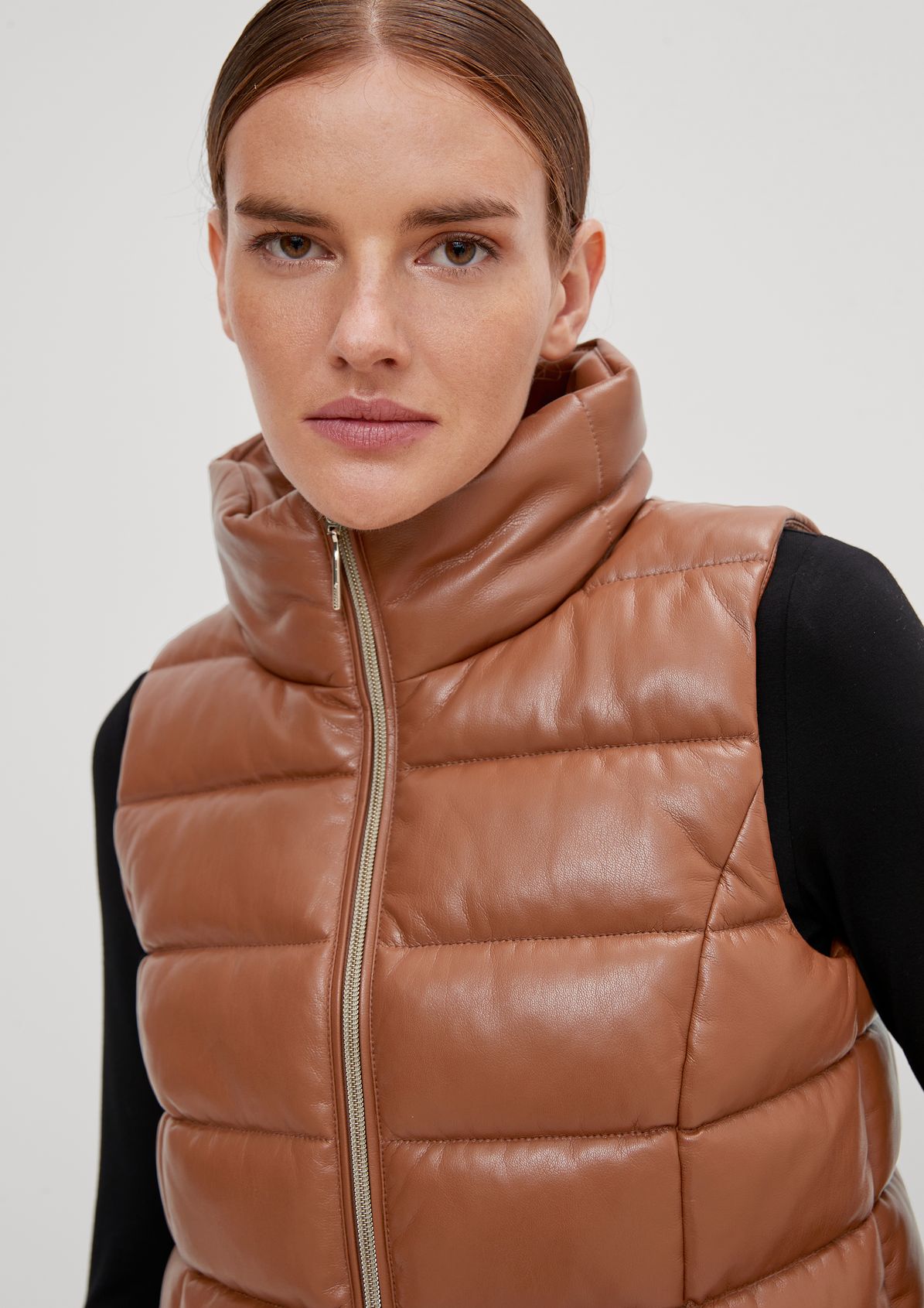 Faux leather quilted body warmer from comma