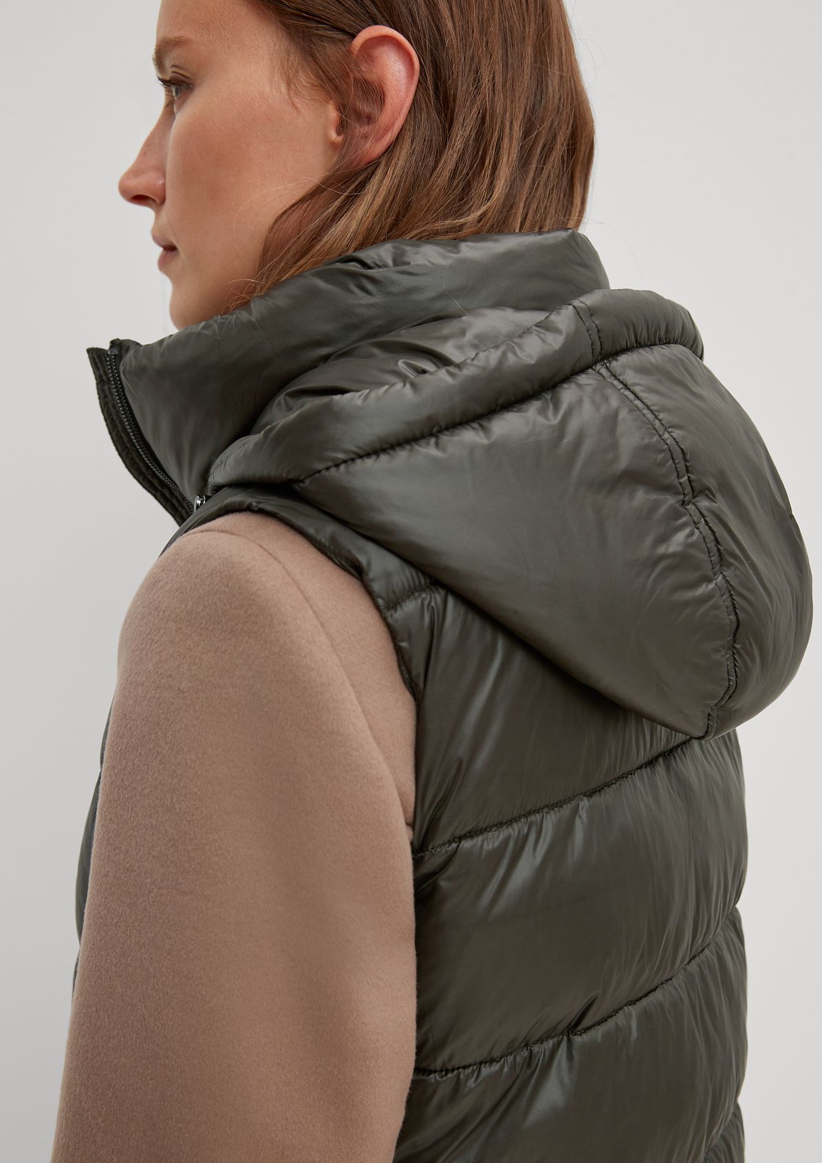 Long quilted body warmer with padding from comma