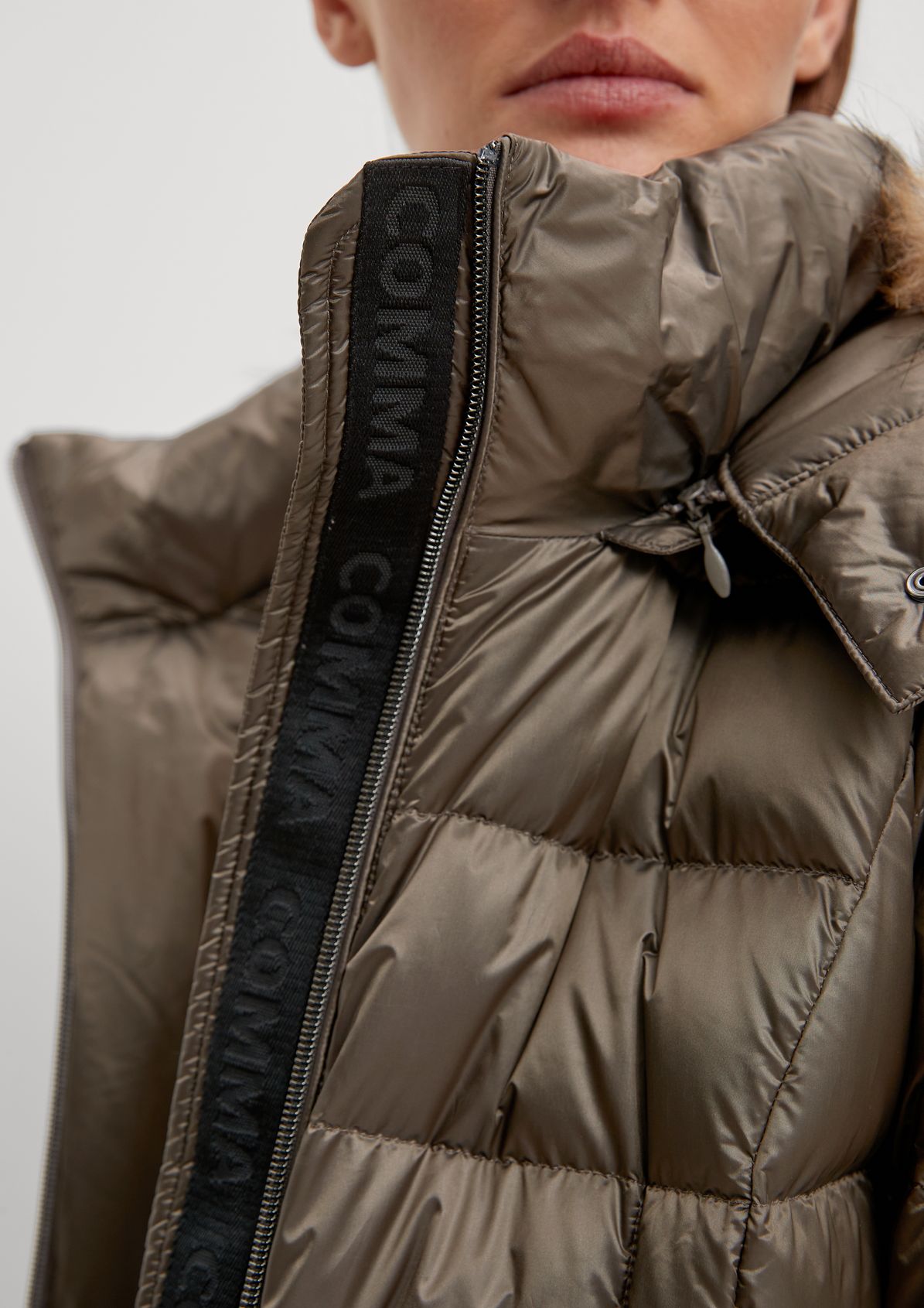 Coat with a detachable hood from comma