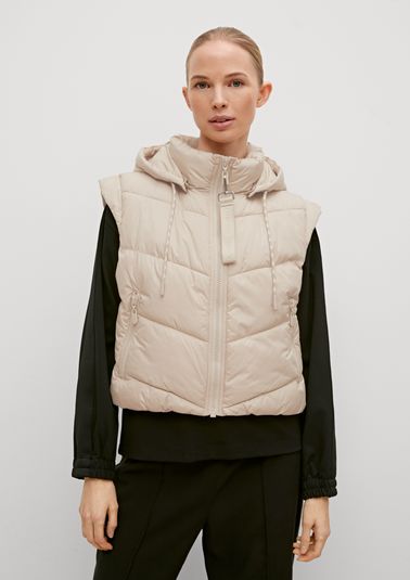 Quilted body warmer with a detachable hood from comma