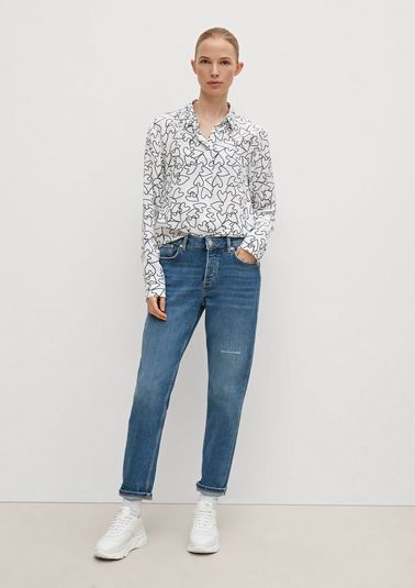 Relaxed: Jeans with distressed details from comma
