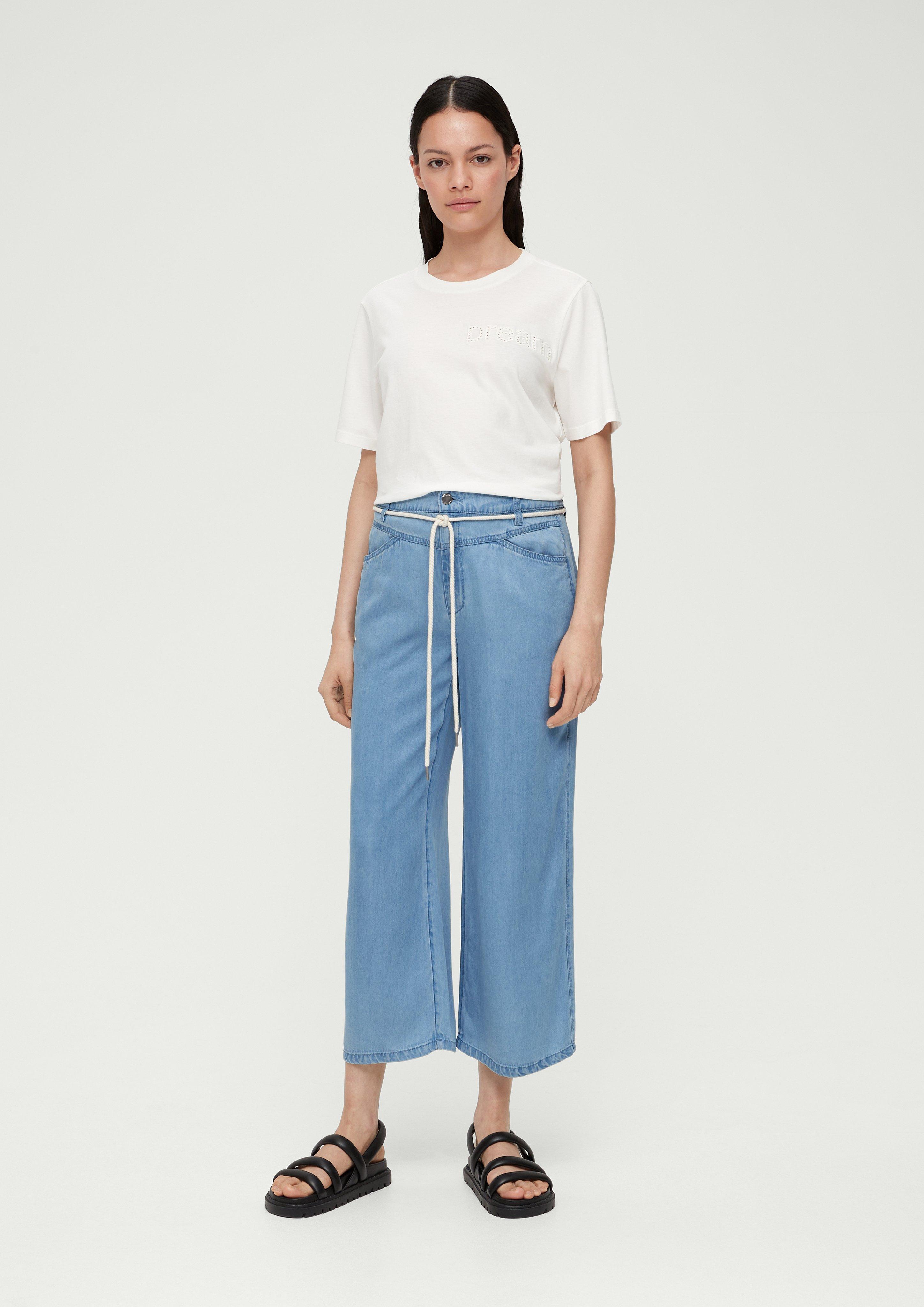Satin jeans in 7/8 length with a fine garment wash